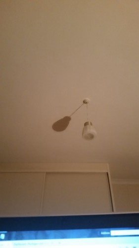 this is my ceiling - it has a light hanging from it