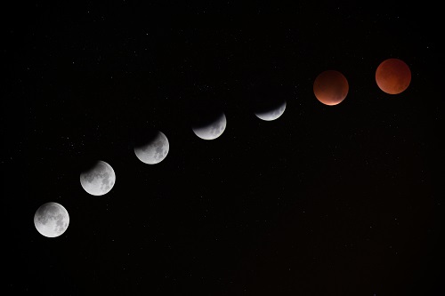 This photograph if a series of moons. It was taken by Jake Hills and published at Unsplash.com